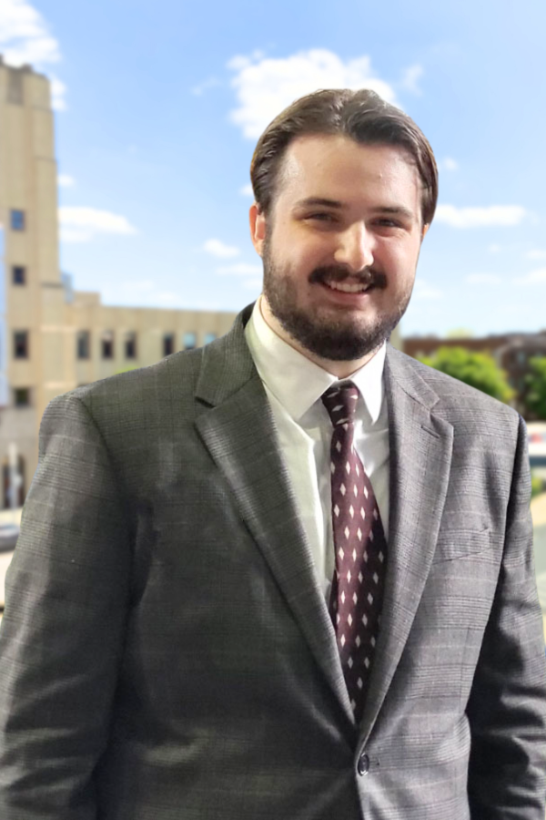 a photo of a man in a suit